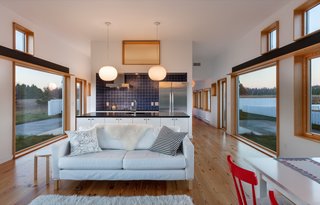 The walls are white-painted sheetrock and the floors are lined with local pine.