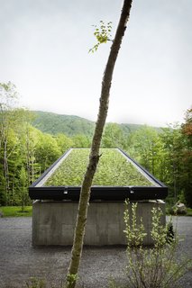 Approached from above, the home blends into the landscape thanks to an expansive green roof that's set on SOPREMA elastomeric waterproofing membrane. In winter, the house is disguised under a blanket of snow. 