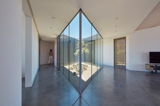 The house is organized around a diamond-shaped inner courtyard.