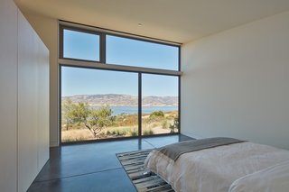 The master bedroom overlooks unobstructed views of Lake Berryessa.
