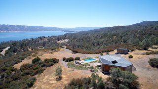 Perched high on a clearing, the Goto House overlooks views of the Napa County hills and Lake Berryessa.