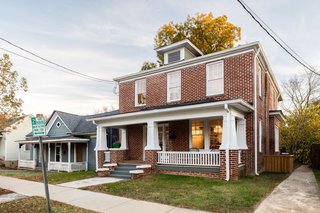 Preserved and repointed brick along with repaired exterior trim and a fresh coat of paint breathe new life into the historic home. The roof is asphalt shingle.