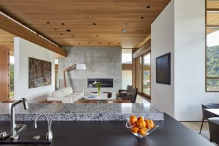 A view of the living area from the kitchen. The luxury gas fireplace is from Ortal.