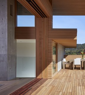 Large roof overhangs provide protection against unwanted solar heat gain.