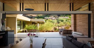 Fleetwood sliding pocket-doors erase the boundaries between indoor/outdoor living in the great room.