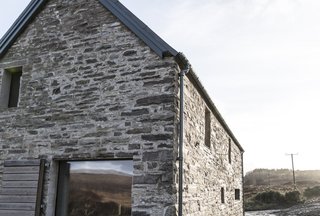 According to the owners, this two-story stone building is the only inhabited house to enjoy uninterrupted views along the length of the sea loch to the North.