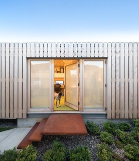 The window and door frames have also been built from untreated yellow cedar, which will weather to a gray patina.