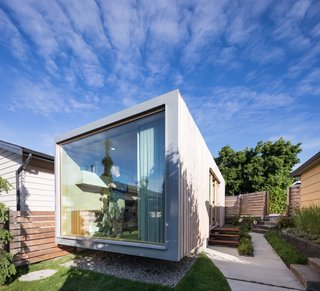 RBA Studio cantilevers over its concrete foundation by seven feet, and draws utilities from Randy's 1930s residence.