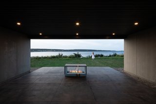 Connected to the plunge pool, this ground-level terrace with a fireplace is perfectly positioned for beach views.