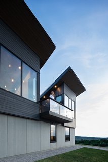 The deck projects out toward the beach.