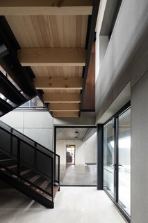Here is a view of the internal breezeway seen from the entry atrium on the side of the guest bedroom to the garage.