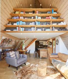Completed between the birth of their third child and Anthonie’s doctoral defense, the built-in library is one of the couple’s favorite features in the cabin.