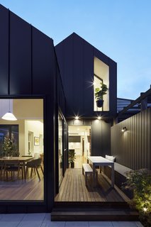 A cozy outdoor patio is located next to the dining room.