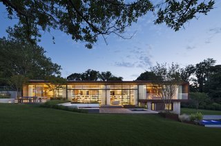 A 100-foot-long glass wall opens the view up to views of the bay.