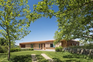 The home's shell of timber and corten steel will develop a natural patina over time.