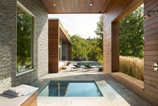 Energy efficiency was a guiding design principle behind the project. The house is powered by 13 large solar panels as well as deep geothermal wells. All the mechanical systems can be monitored and controlled remotely.