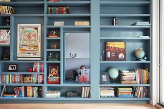 A panel in the Megacabinet swings open to reveal a hidden reading nook.