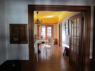 A before image shows the home's main living areas received scant natural light.