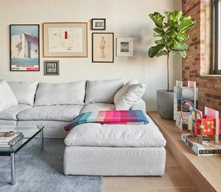 The sectional is from Restoration Hardware, while the rug is by BluDot.