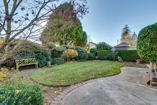 The home's landscaping has been meticulously cared for and preserved.