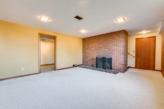 A second fireplace can be found in the downstairs recreation room.