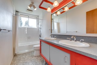 The upstairs bathroom includes a double vanity.