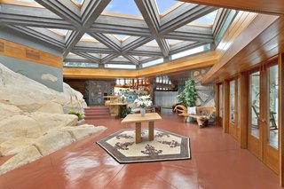 The 26 triangular skylights—covering a total area of 1,500 square feet—in the home are domed, although Wright would most likely have chosen flat skylights. Massaro reportedly said he did not choose flat skylights due to their propensity to leak.