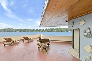 The tip of the cantilevered section is an outdoor living area with a double-sided fireplace.