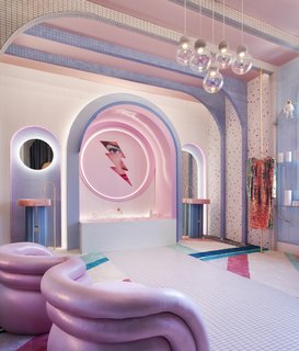 The focal point of the room is "Thunder Face" by Paul Fuentes, a David Bowie-inspired print that features the model Ronja Okane as a 21st-century superhero. The fabric on the walls, ceiling, and furniture were sourced from Gaston and Daniela.