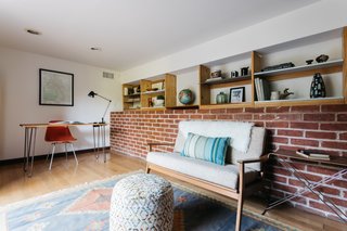 The detached office, approximately 150 square feet in size, is located south of the living room and opens up to the outdoors.