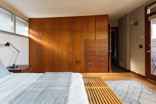 The cabinets in the bedrooms and hallway are built from teak.