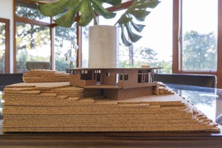 A laser-cut model of the home. The recently added rear deck is not shown.