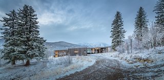 Spread out over 4,942 square feet on an 11.76-acre gently sloping site, the Gammel Dam House includes five bedrooms, one bunk room, and three-and-a-half baths. The home can easily accommodate up to 14 people in the two-story guest wing that can be closed off when not in use.