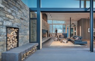 Custom sliding doors extend the living areas to the outdoors.
