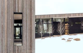 The exterior is clad in pre-finished inland cedar and shou sugi ban-charred wood.