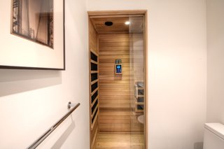 One of the bathrooms includes a dry sauna. 