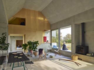 The interior is finished with the same materials and colors as the exterior. In winter, when Hamra is used as a one-bedroom residence, only the private part of the house (delineated by the timber surfaces) is heated.