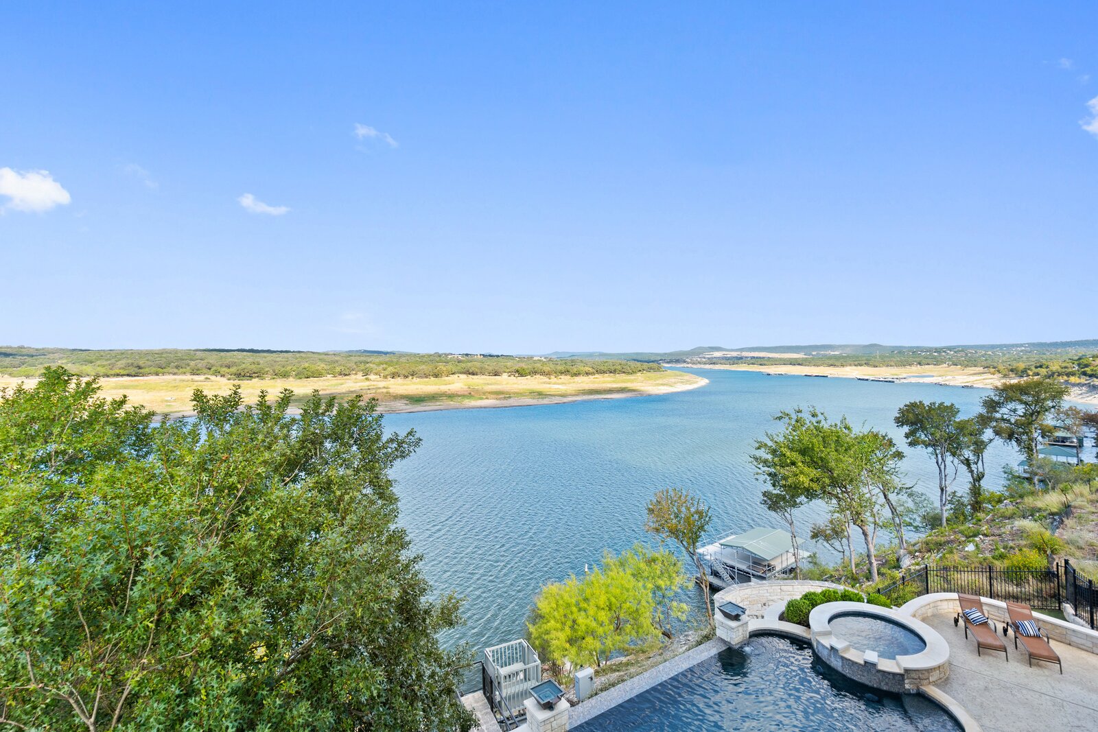 Photo 2 of 8 in On the Market Lake Travis Waterfront ResortStyle Property by Deluxe Living Dwell