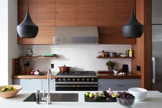 What's the Most Overlooked Feature When Planning a Kitchen Renovation? - Photo 1 of 17 - Agencie believes that kitchens are modern-day parlor rooms, incorporating stunning visual elements in the design. A majestic Lacanche range takes center stage in this kitchen.