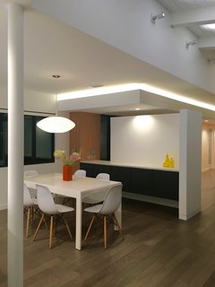 New dining with new custom buffet side board and soffited ceiling with cove lighting.
