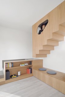 The large furniture even holds the stairs leading up to the attic.