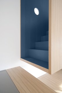 Detail of the stairs and the blue MDF inside