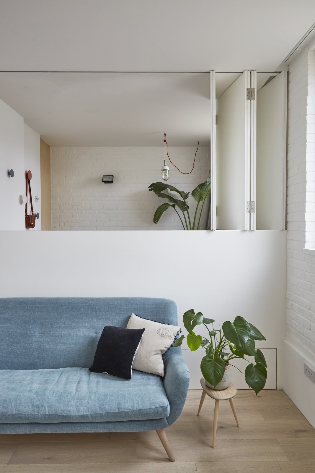 Scandinavian furnishings bring a lived-in aesthetic to the living room