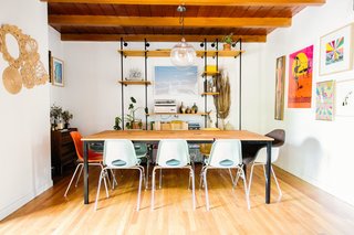 Dusty also built the table and custom industrial bookshelf in the dining area.