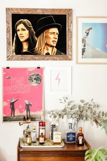 The home is filled with skateboarding memorabilia and art made by friends. The velvet painting is by a Tijuana artist.