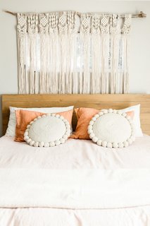 The on-trend macrame hanging in the bedroom is by Las Vegas artist Veronica Torres-Miller.