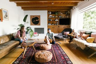 The midcentury living room is perfect for family movie night and dance parties.