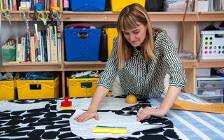 Van Dusen began making her own clothing as a teenager after convincing her mom to buy a sewing machine she'd use to reconstruct her closet full of thrift store garments. Color was her primary muse, often favoring bright hues in unexpected combinations and graphic patterns. What she couldn't find, she created, albeit inefficiently — the only way she knew how — by assembling her own printed textiles, one element at a time.
