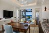 Modern home with Office, Dark Hardwood Floor, Chair, and Study Room Type. Study Photo 16 of Manini`owali Villa 5
