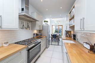 The decor in the living areas is neutral, which helps to create a sense of continuity throughout the space.